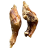 Two venison achilles dog treats on a grey background, shaped like the tendon of an achilles leg.