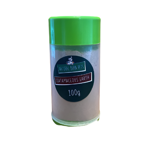 A green cylindrical container labeled 'Natural Born Pets Diatomaceous Earth 100g' used for flea treatment.