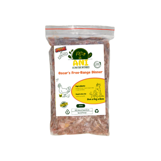 Packaging of Oscar's Pure Free Range Chicken Mince displayed with assorted fruits and vegetables in the background, suggesting natural ingredients.